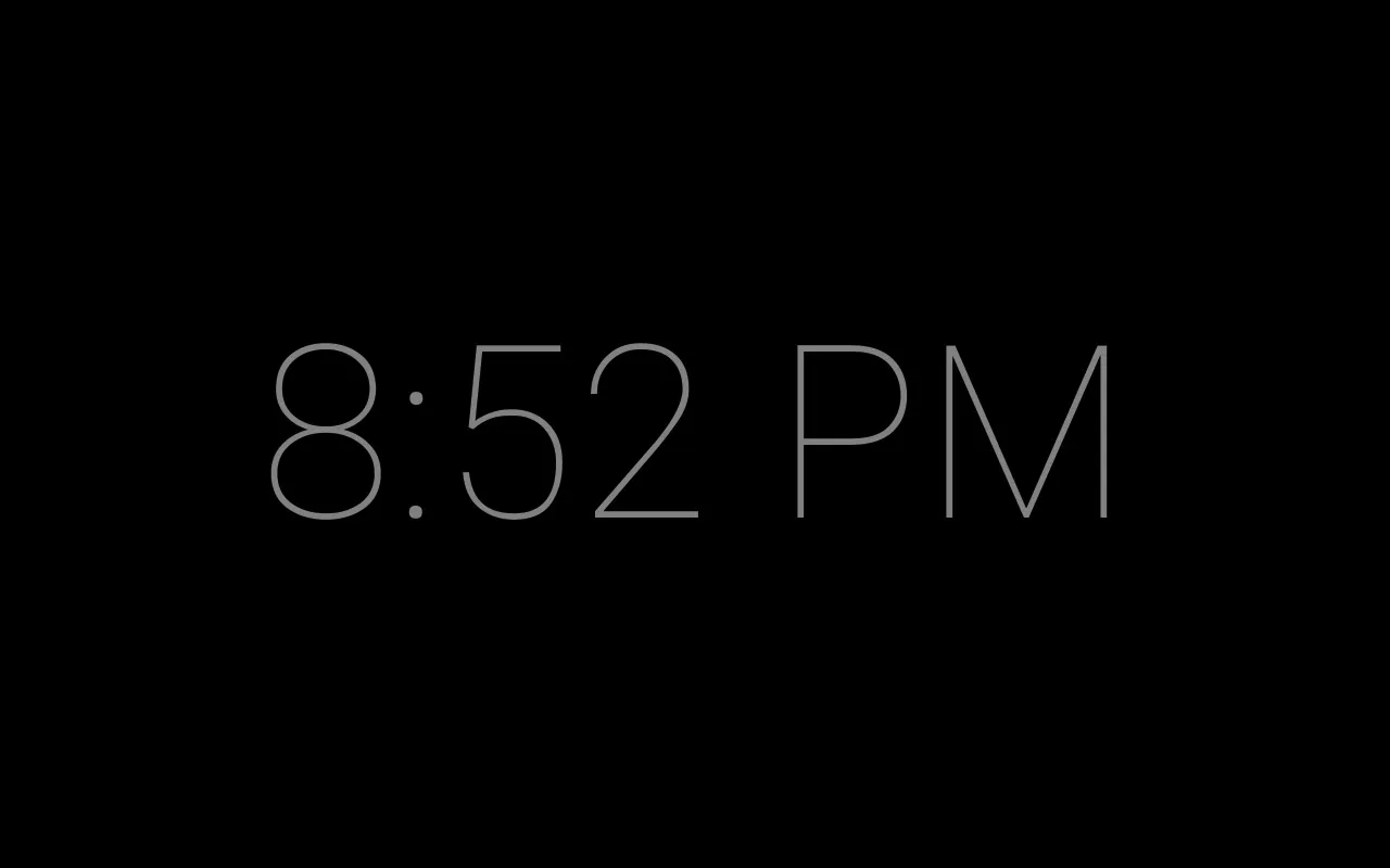 Away mode: a dim clock on black