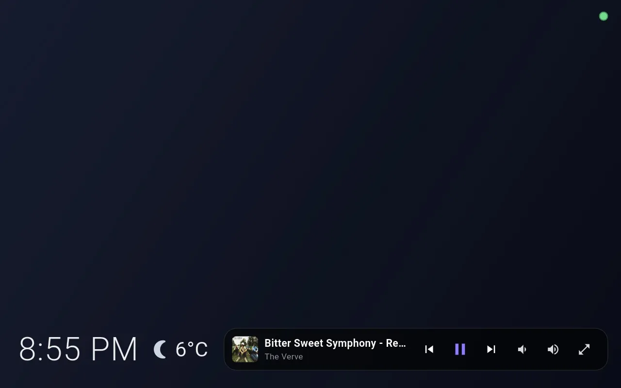 Compact music bar beside the clock
